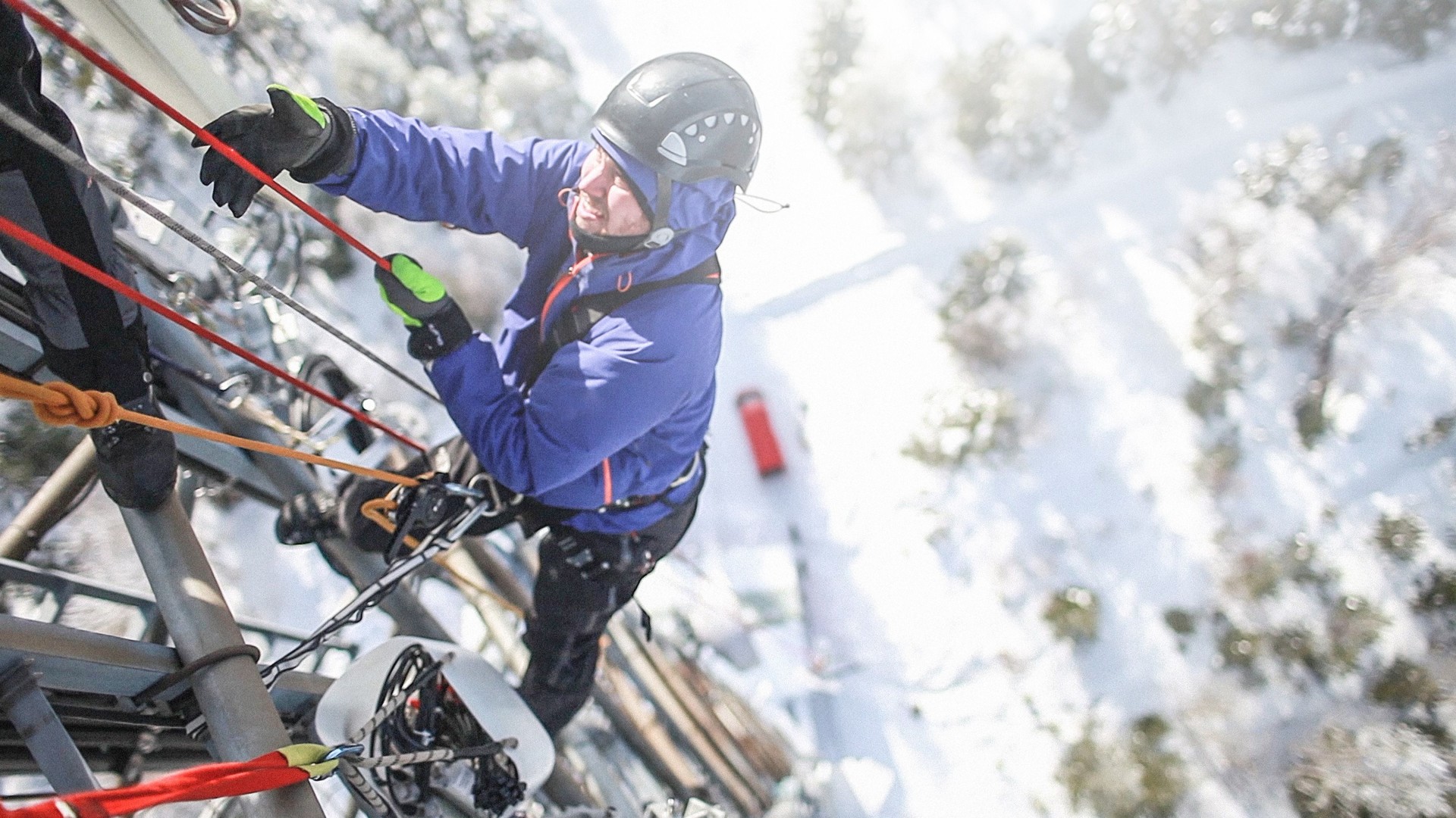 Telecommunication manual high worker engineer climbing an antenna